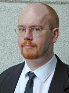 Abbildung 1: Crispin Cowan: "Einfachheit ist die Seele der Sicherheit. Während SE Linux die Ansprüche der NSA erfüllt, ist App Armor für Linux-Normaluser gemacht."