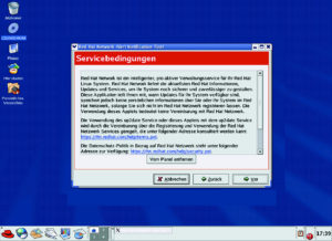 Abbildung 2: Der Desktop von Red Hat 8.0 ist sehr nüchtern. Die blinkende Erinnerung an das Red Hat Network lässt sich ebenfalls abstellen.