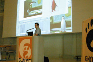 Abbildung 1: Links: Novell demonstriert auf der GUADEC das Portable Usability Lab. Mitte: Dreamworks produzierte schon mehrere Animationsfilme ausschließlich mit Linux. In "Madagascar” spielen auch Pinguine eine tragende Rolle. Rechts: Ubuntu-Förderer Mark Shuttleworth legt seine Pläne für die kommende Release Breezy Badger dar.