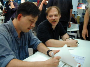 Signierstunde mit Illiad und Eric S. Raymond (rechts).