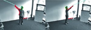 Abbildung 3: Die Person zeigt auf eine Deckenlampe. Die Kontur des Kopfes ist grün eingezeichnet, und die erkannten Armkonturen sind rot markiert.