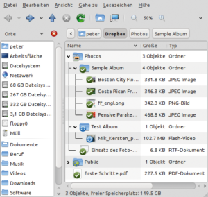 Abbildung 8: Für Gnome-Anwender optimal: Die Dropbox-Software gleicht den »Dropbox«-Folder im Homeverzeichnis automatisch mit dem Server ab und zeigt in Nautilus den Synchronisationsstatus für Dateien und Ordner an.