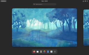 Abbildung 1: Fedora 34 nutzt Gnome 40 als Desktop, das unter anderem die Arbeitsflächen horizontal anordnet und das Dock an den unteren Fensterrand klebt.